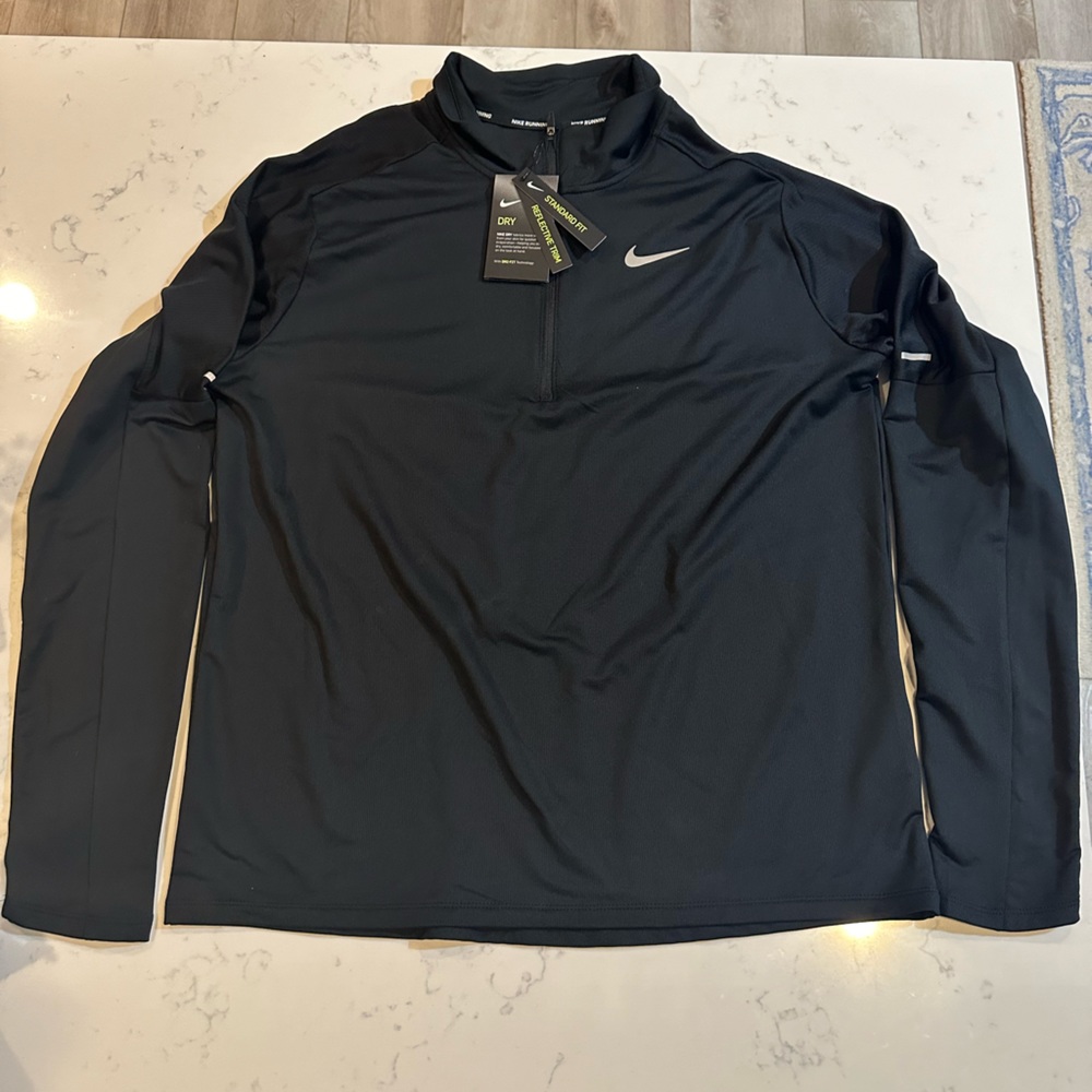 Nike performance quarter zip. Men's Size large.
